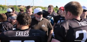 Head Coach John Moore rallies his troops post win